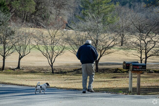 Residents in Holly Springs enjoy peaceful walks along the neighborhood’s many scenic trails.