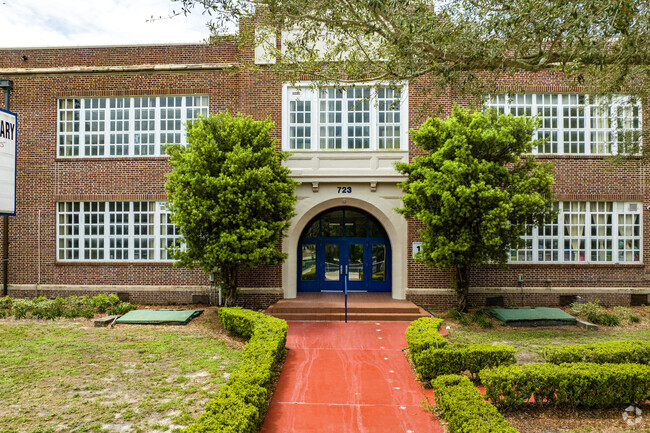 Cleveland's original brick structure cost $128,000 and opened to 400 students.
