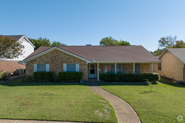 A typical mid-century ranch home in Duncanville Texas will have a large yard around the home.