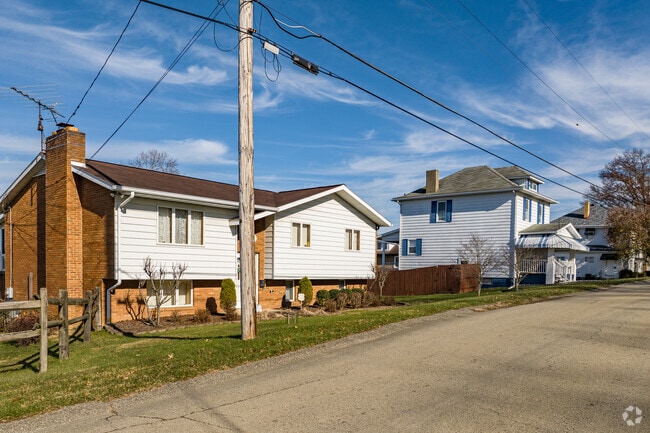 A row of different styles of homes.