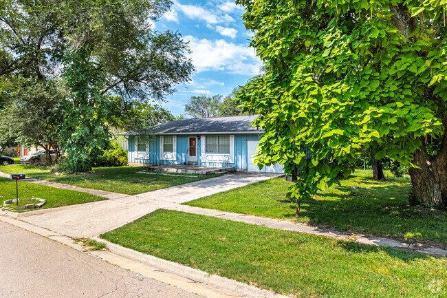 Turnkey ranch-style and split-level homes in Jefferson Square shaded by mature trees.