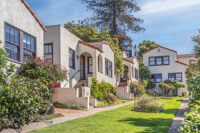 A cluster of Spanish Style homes are built into the steep hillside.