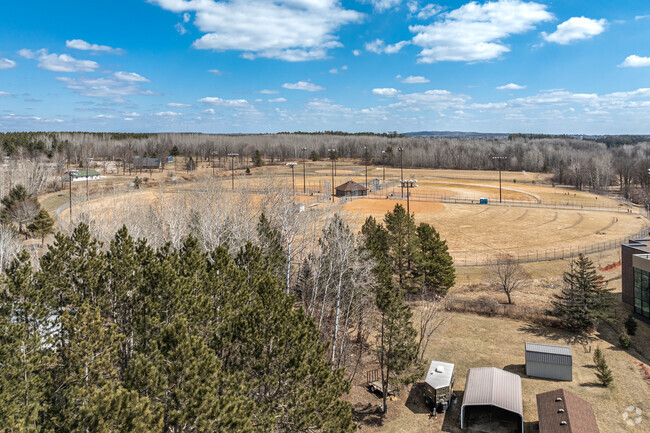 A large ball field is located next to East Rapids Elementary School.