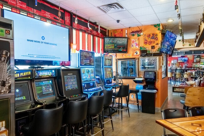 Catch the Packers game and enjoy a pub meal at Mid Town Pub in Orchid Heights.