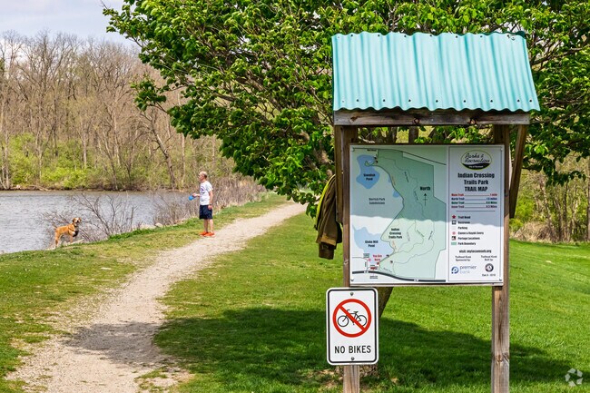 Indian Crossing Trails Park is home to over two miles of trails bordering Globe Mill Pond.