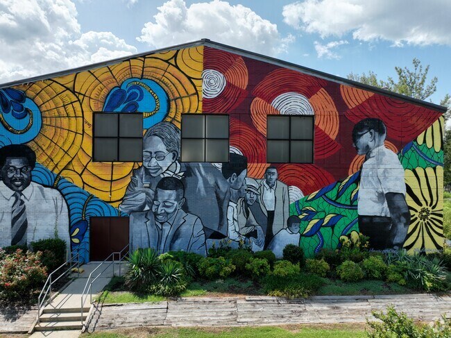 The mural on the Hyatt Park recreational building signals a great time awaits families.