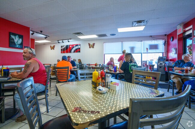 Pull a chair at one of the tables inside B&N Diner and enjoy a great meal near Seasons Four.