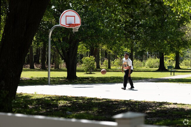 Basketball games bring neighbors together at Brigadoon Pines Park.