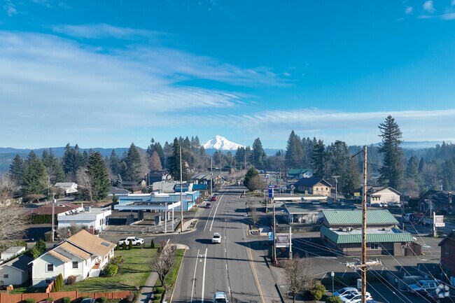 Sandy is connected to both Mount Hood in the southeast and Portland.