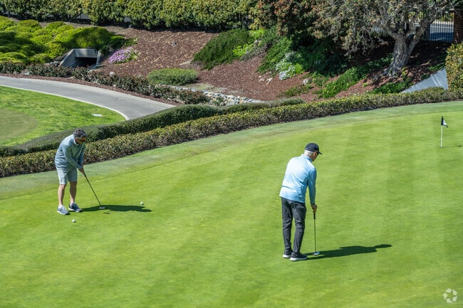 The El Niguel Country Club features a pristine golf course, restaurant, and other facilities.