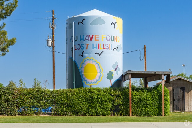 A large mural welcomes guests and travelers to the city of Lost Hills.
