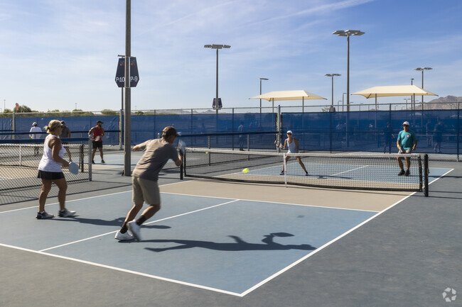 South Gilbert residents enjoy a game of pickleball on a sunny morning in Gilbert Regional Park.