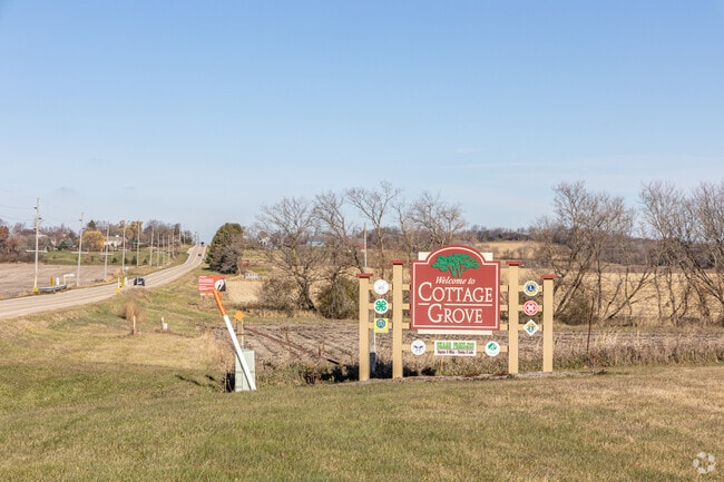 A warm welcome awaits at the Cottage Grove entrance sign.