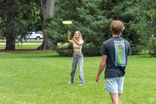 A young Mulberry Hill couple take time to play frisbee at the nearby City Park.
