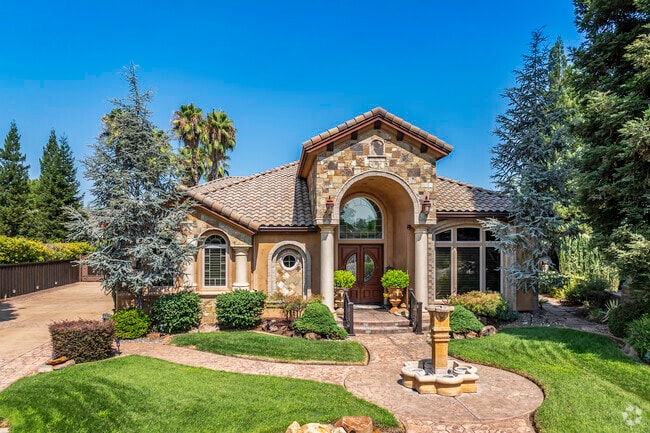 This large Mediterranean-style home is made mostly of rock in Gold Hills.