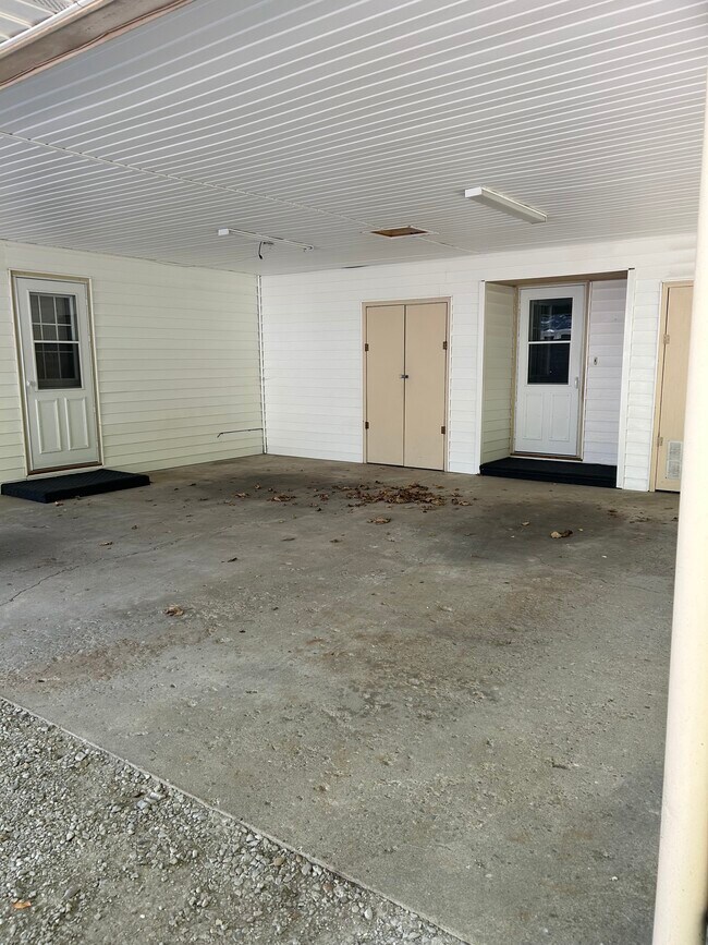 No shared wall, but shared carport