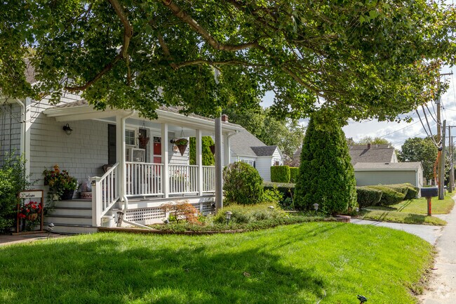 This row of homes in the North Warren neighborhood has brilliant shade and light dappling them.