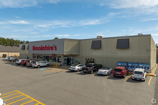 Hot Springs Village residents shop for groceries at Brookshire's located just outside the western gate.