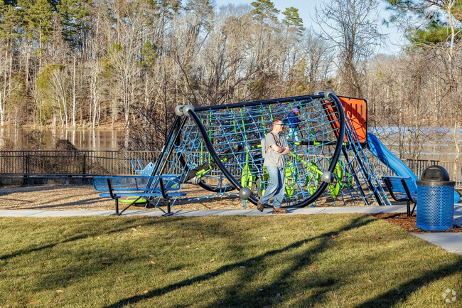 Kids from Florence enjoy climbing ropes at High Point City Lake Park.
