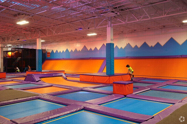 Local kids playing at Altitude Trampling Park near the Columbia community.