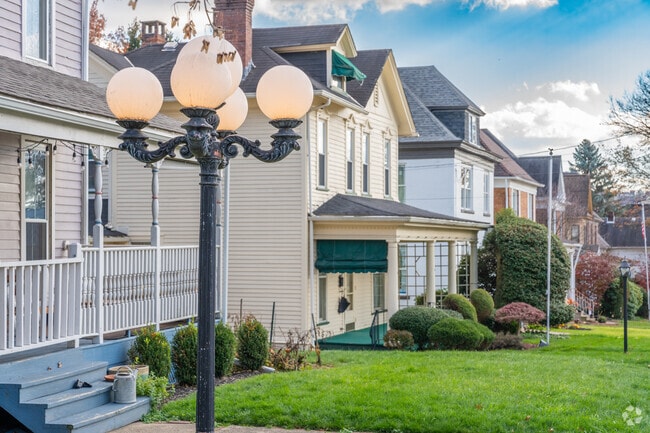 This neighborhood lamp post in Butler is classy in style along beautiful rows of homes.