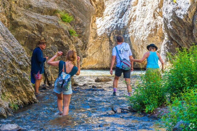 Water flows from the Sangre de Cristo Mountains into Nambé Falls near El Rancho.