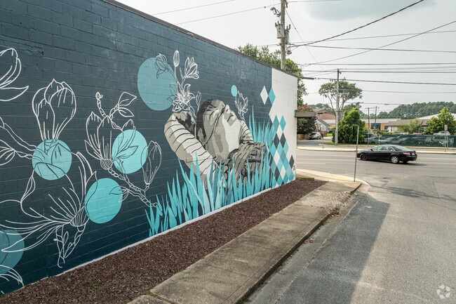 One of Doverdale's Dream Murals appears on a store along business Rt 13.