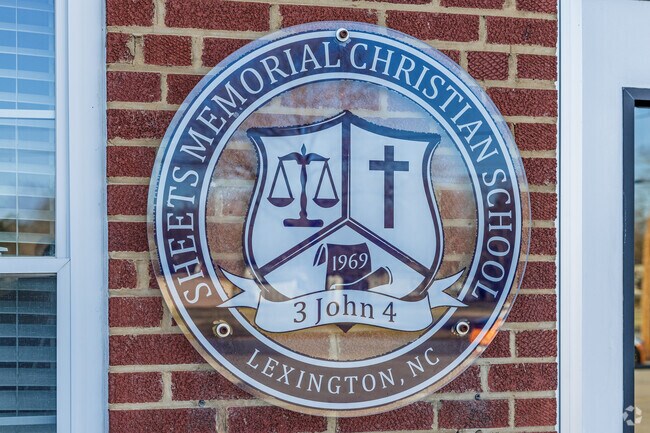 The crest of Sheets Memorial Christian School showcases the verse 3 John 4.