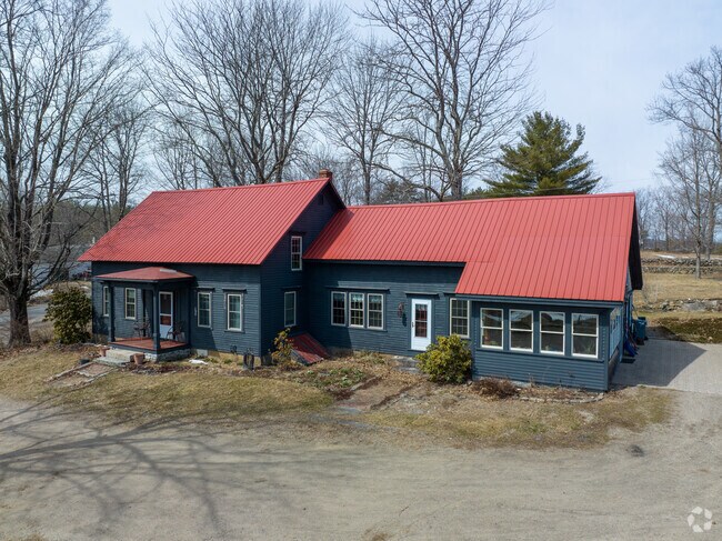 This Cape Cod-style home in Limerick has a unique color combination.