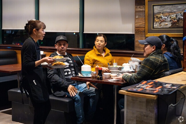 Guests enjoy Pad Kee Mow and Pad Thai at Thai Dawn near Mesa Linda .