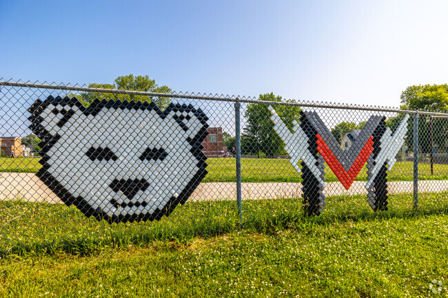 The school grounds are decorated with symbols of school pride.