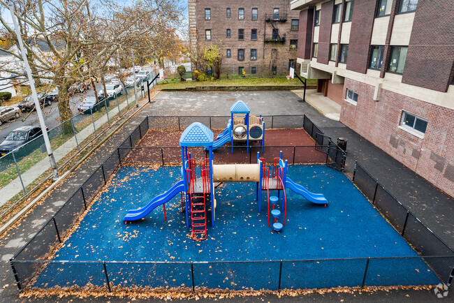 Students enjoy playing on the playground at Edward Williams School in Mount Vernon.