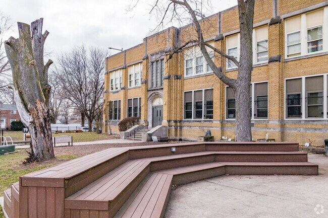 Oriole Park Elementary School has raised seats at the entrance of the school.