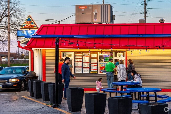 Visitors to Dairy Zone in Fairground can drive through or utilize a picnic table outside the window.