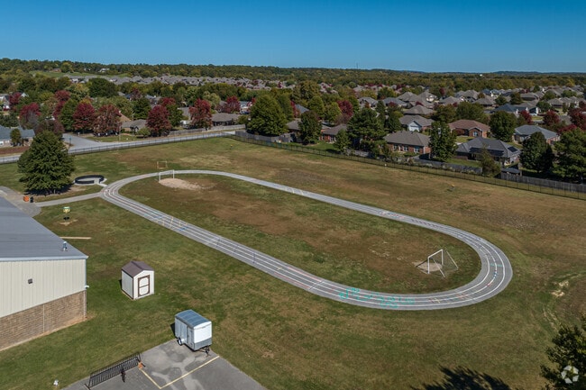 Holcomb Elementary School has a track and field.