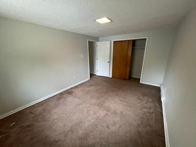 bedroom facing closet