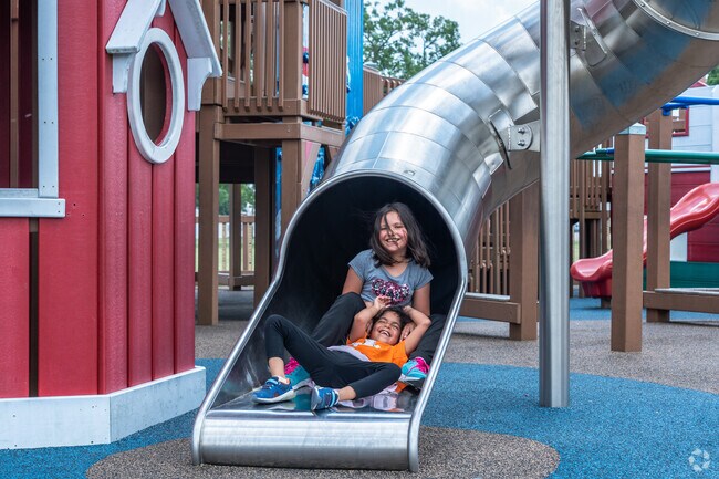 Kenosha Dream Playground near St. Peter's has a great slide for kids.