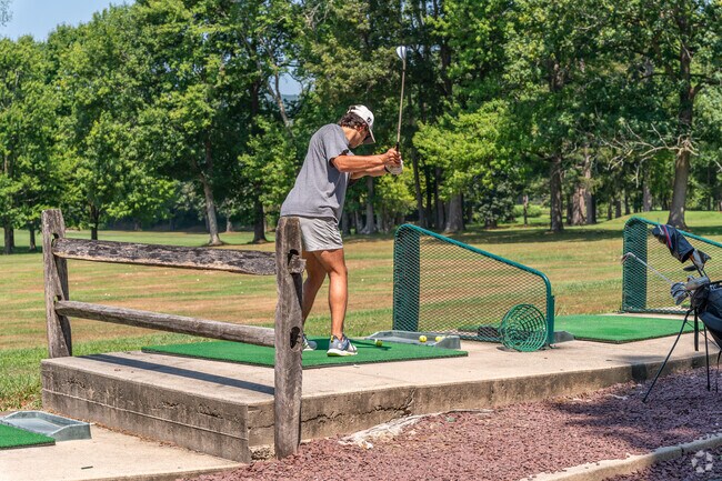 Spook Rock Golf Course near Montebello has a driving range with scenic target greens.