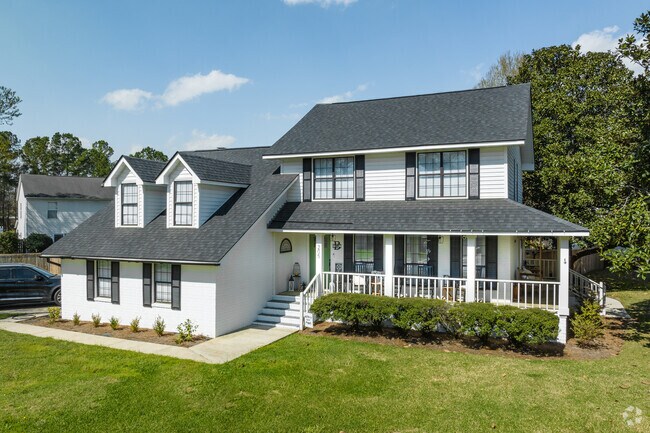 Home with Gable Roofs and Porches