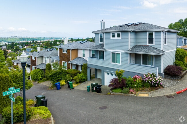Newer homes built on a hill in Beacon Hill.