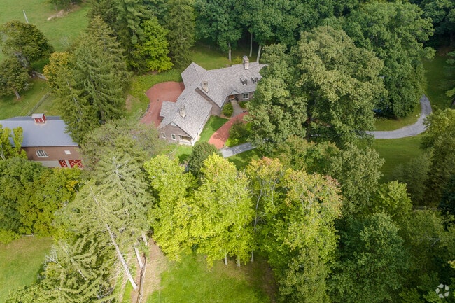 This custom redwood home enjoys maximum seclusion and privacy in Sewickley Hills.