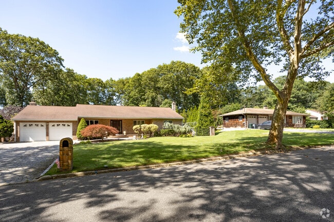 Rows of ranch-style homes can be found in Dix Hills.