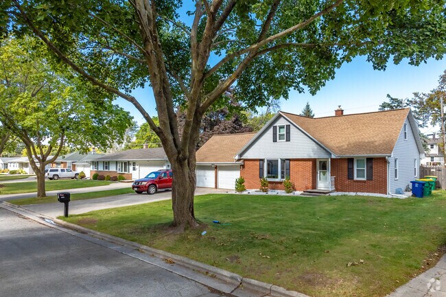 Shaded front yards in the Baird Creek neighborhood are common.