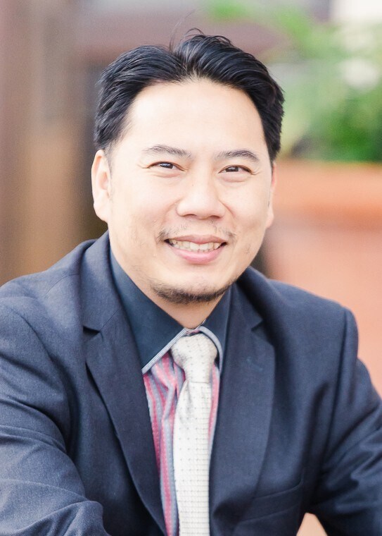 Conrad Tan