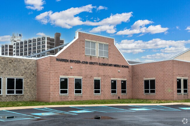 Name on wall for Warren Snyder - John Birotti School in Bristol.