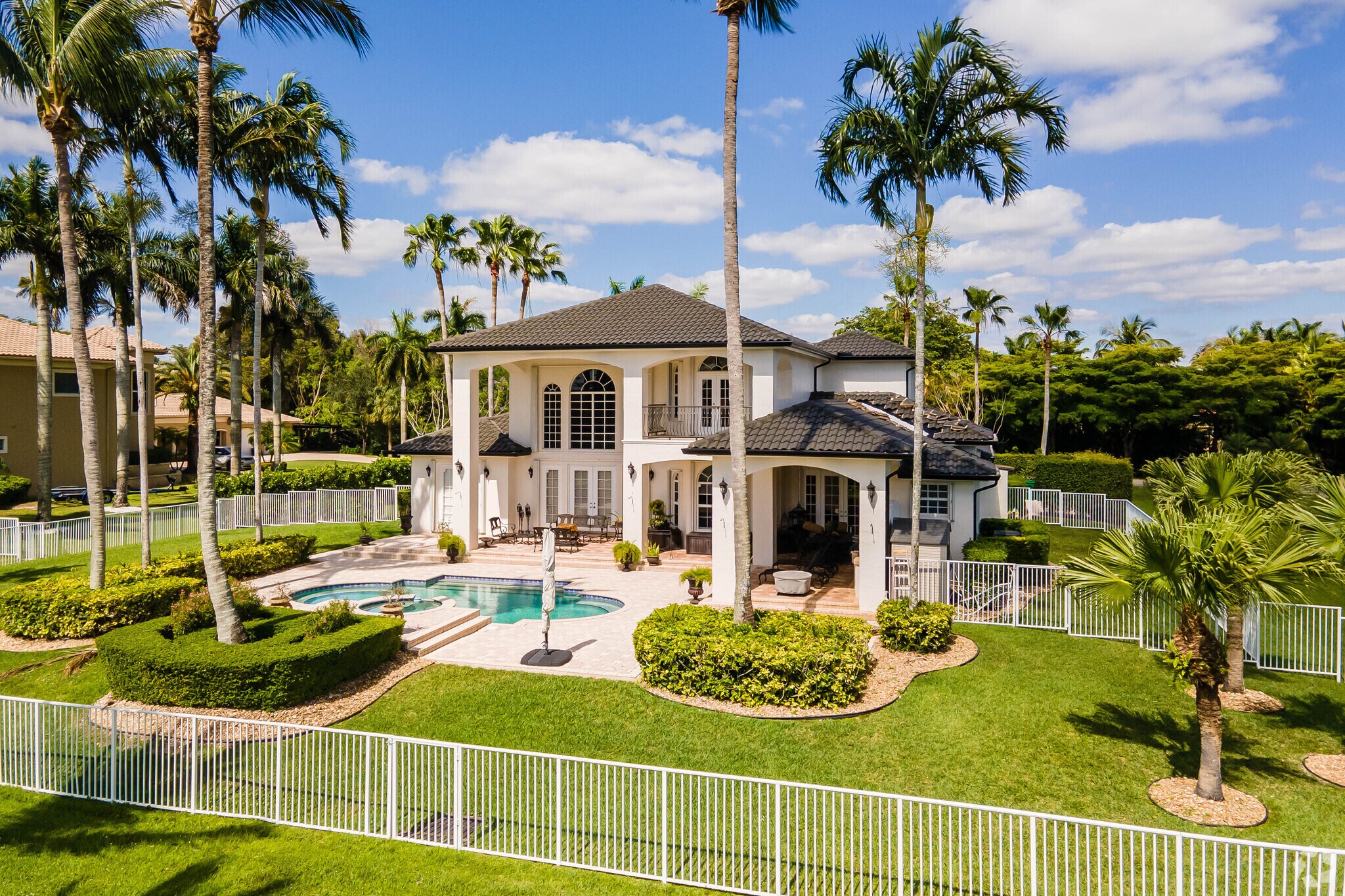 A Mediterranean style home on a lake in Cooper City.