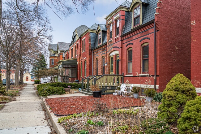 Street with red brick multi-level homes in Pullman.