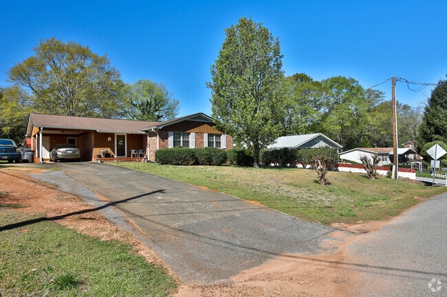 Tree-lined streets and larger lots are common in parts of Gantt.