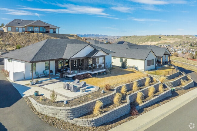 Newer homes boast incredible views from the West hills of Selah.