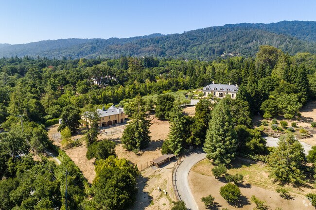 A lot of estates in Woodside, CA have large stables for horses to roam.